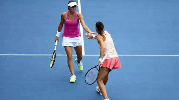 Flavia Pennetta e Martina Hingis in doppio agli Us Open.