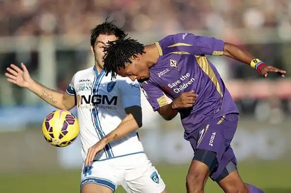 Fiorentina bloccata in casa nel derby con l'Empoli: viola avanti con Vargas, ma recuperati nella ripresa da Tonelli. Sciupata una buona occasione per avvicinarsi al terzo posto.