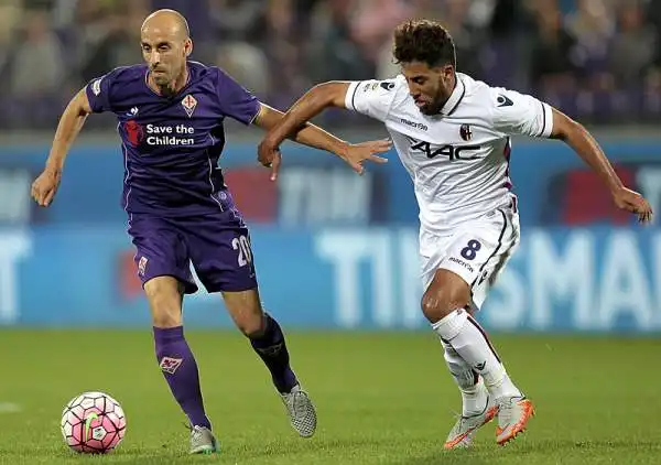 Sale nelle zone alte della classifica la Fiorentina che batte Bologna nel derby dell'Appennino grazie ai gol di Blaszczykowski e Kalinic negli ultimi venti minuti.