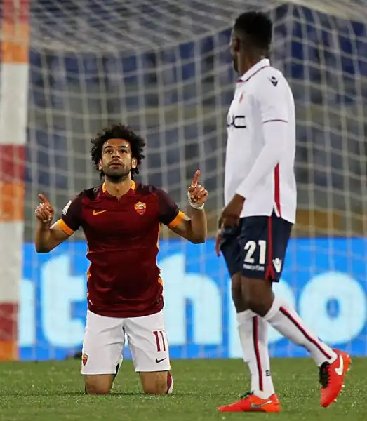 La Roma non riesce ad abbattere il muro del Bologna, pali compresi: allOlimpico il posticipo della 32esima termina in pareggio, gol di Salah e Rossettini.