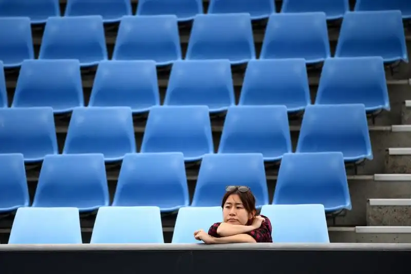 Una fan di Nishikori in attesa del match