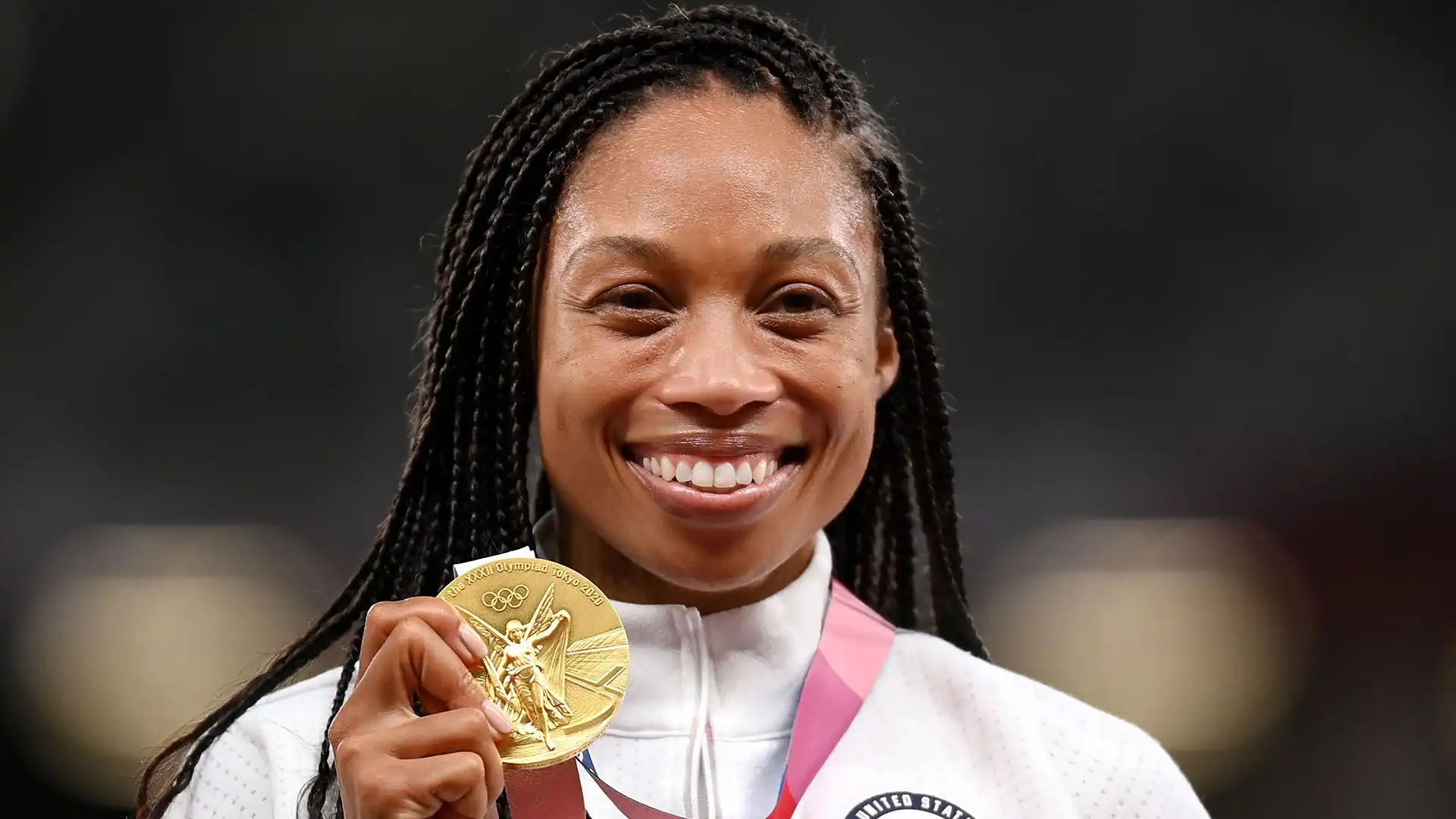 Nel 2021, ha vinto la medaglia d'argento nei 400 metri piani alle Olimpiadi di Tokyo, diventando la donna più medagliata nella storia dell'atletica leggera americana
