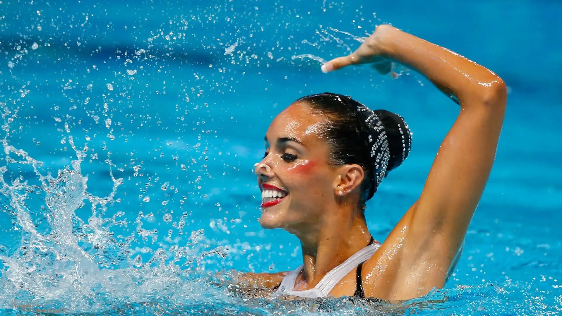"E' un giorno di cambiamento, di evoluzione. Sono felice e contenta di aver presto questa decisione", ha annunciato la nuotatrice spagnola.