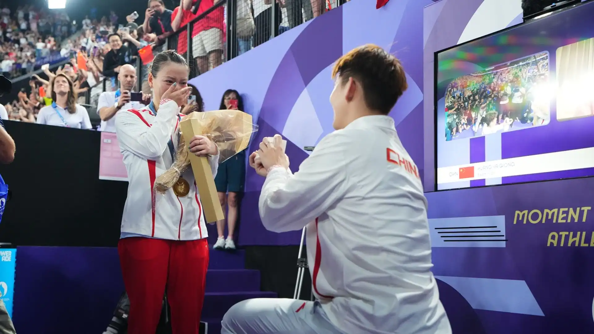 L'atleta cinese di badminton, dopo aver vinto l'oro nel doppio misto, ha ricevuto la proposta di matrimonio da parte del suo fidanzato