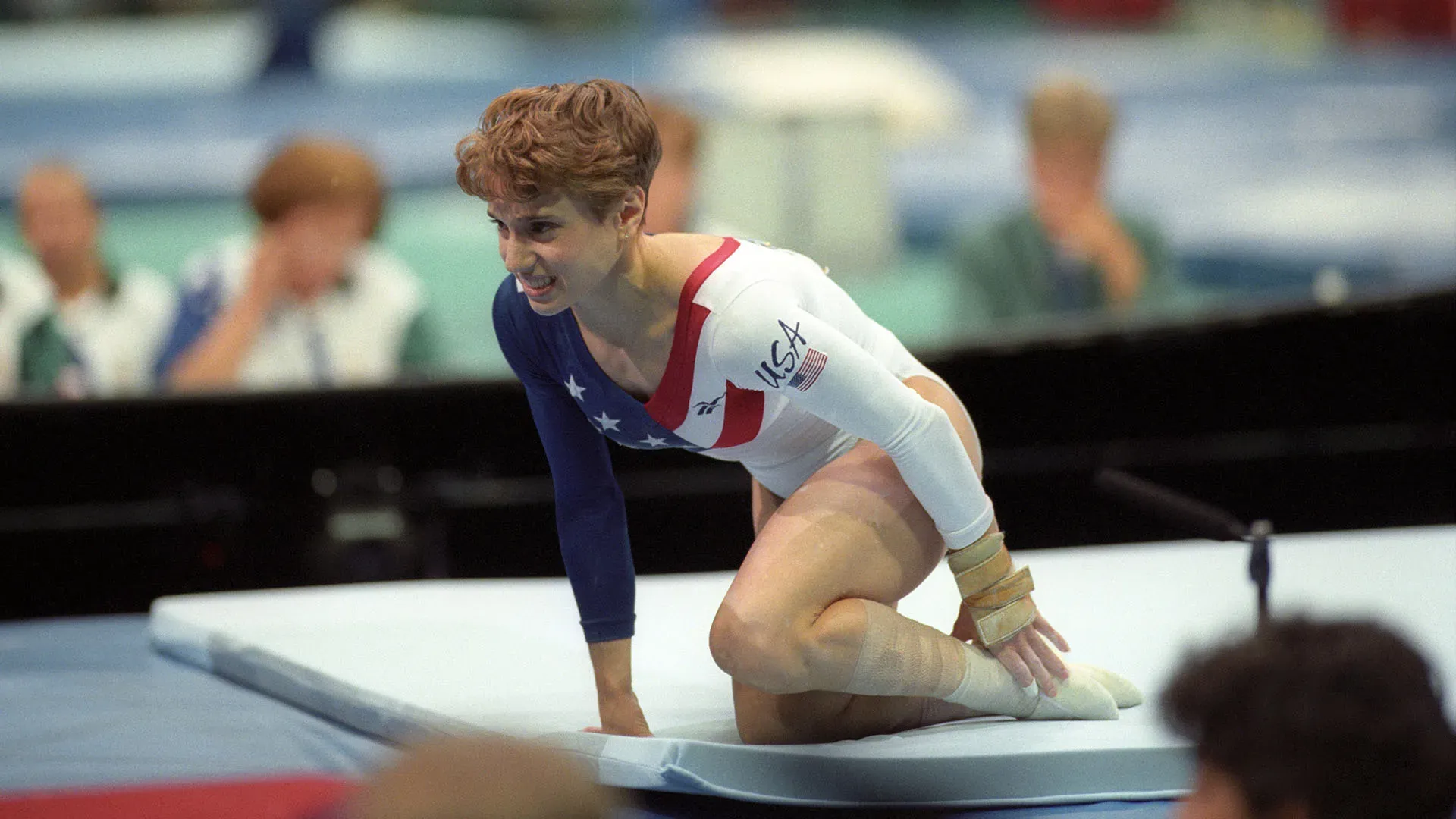 Alle Olimpiadi di Atlanta 1996, la campionessa si infortuna gravemente alla caviglia durante la finale a squadre di ginnastica artistica